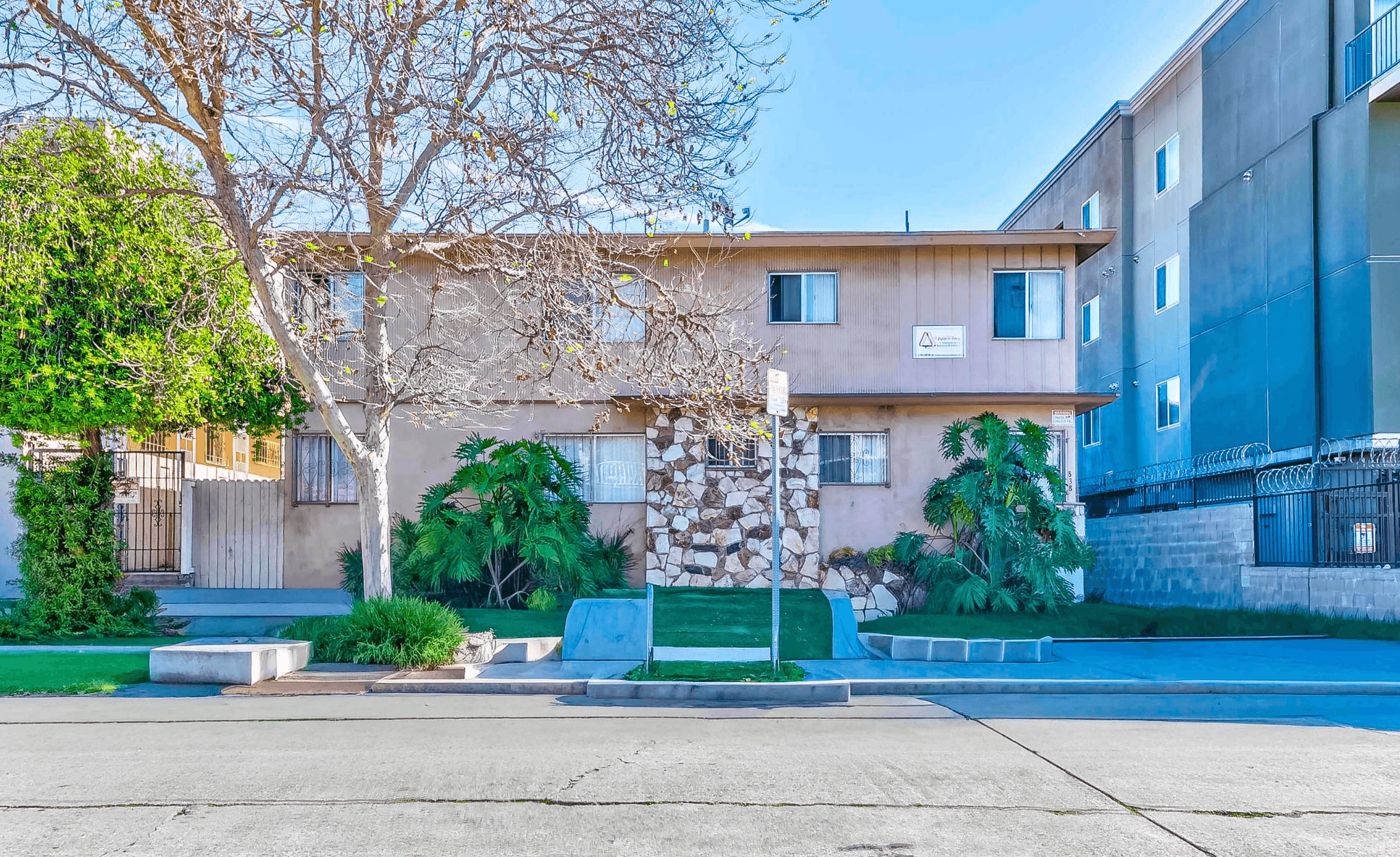 838 S Gramercy Pl 8-unit apartment building front exterior in Koreatown, Los Angeles