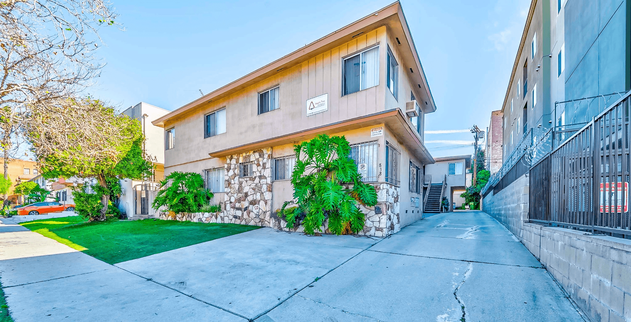 838 S Gramercy Pl driveway and front entrance with designated parking